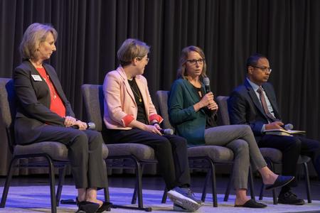 Renee Dauer, Beth Madison, Kim Jones, and Santhosh Abraham discuss being salt and light in the workplace during chapel. - Photo by Abigail Aspinwall