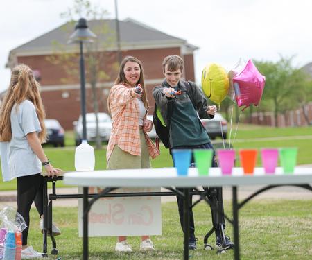 Hannah Juliussen and Nathan Golden have fun at ResLife's Field Day event. - Photo by Eli Creasy