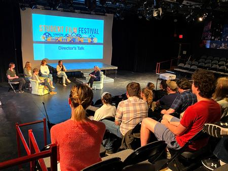 Rachael Camp, assistant professor of communication arts, interviews student directors about their films during the 2022 Union Student Film Festival. - Photo by Cam Tracy