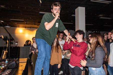 Students enjoy a Brother Moses concert in Barefoots Joe. - Photo by Lyla Dietz