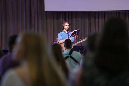 Lucas Brodgen leads worship during the annual commissioning service for graduating seniors. - Photo by Suzanne Rhodes
