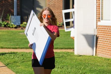 Junior accounting major, Katie McCann, helps move in Union's newest students during freshmen move-in day. - Photo by Suzanne Rhodes