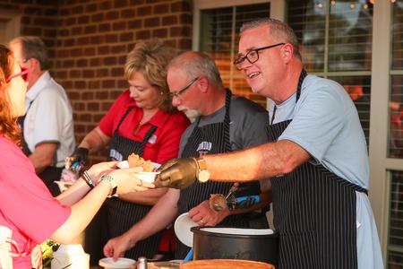 8/21/22 - During Welcome Week, Union's vice presidents serve Union's newest students during the annual ice cream party, hosted at president Dub Oliver's house. - Suzanne Rhodes