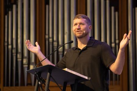 Erik Reed, founder and lead pastor of The Journey Church and president and founder of Knowing Jesus Ministries, speaks in a chapel service. - Photo by Abigail Aspinwall