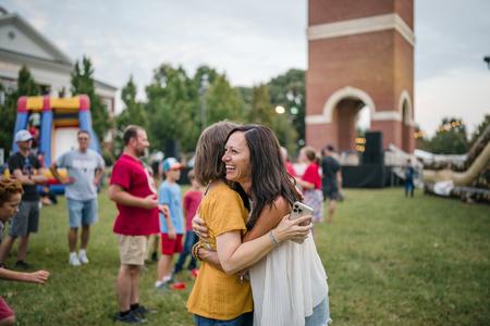 Alumni reunite during Union's special bicentennial kick-off celebration on the Great Lawn. - Photo by Kristi McMurry Woody