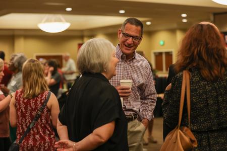 Kay Griffin, current trustee, catches up with a fellow alumnu at the Faculty and Staff Reception during Union's bicentennial kick-off celebration. - Photo by Suzanne Rhodes