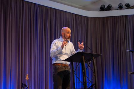 Jay Ridenour ('95), lead pastor and elder at First Baptist Church of Sudbury, Sudbury, Mass., leads a chapel service. - Photo by Lauren Steed