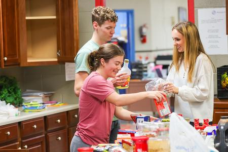 Student Activities Council students volunteer at the Boys and Girls Club of Humboldt, as part of the annual Campus & Community Day. - Photo by Eli Creasy