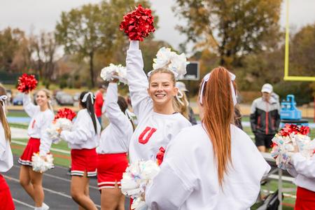 Sydney Rockwell cheers on the Bulldogs during the annual Buster Bowl, as part of homecoming weekend. - Photo by Abigail Aspinwall
