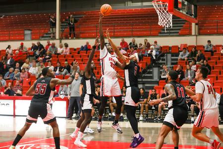 Tylandrius Parks reaches for the basket during the homecoming basketball game. - Photo by Suzanne Rhodes