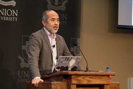Francis Su, Benediktsson-Karwa Professor of Mathematics at Harvey Mudd College and a former president of the Mathematical Association of America, speaks on "Mathematics for Human Flourishing" during the 2023 Scholar-in-Residence Lectures. - Photo by Abigail Aspinwall