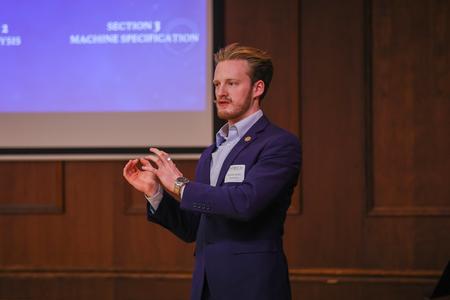 Engineering major Samuel Eudy presents with Nathan Cole and Parker Rice on their project entitled "Designing a Prolink Quality Testing Device" during the 2023 UUSS. - Photo by Eli Creasy