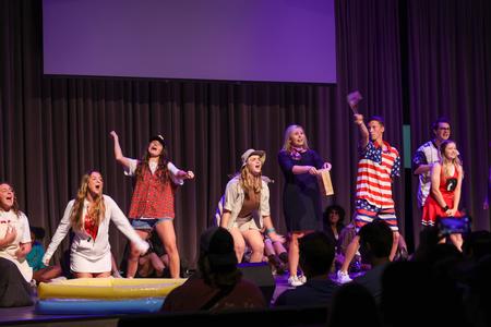 Welcome Week leaders perform the ever-popular "I'm glad that I'm a Welcome Week leader" sketch during the Welcome Week Show. - Photo by Karley Hathcock