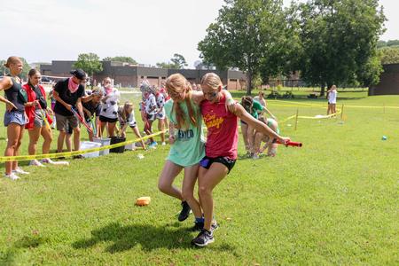 Students race through the three legged section of the Residence Life Half K. - Photo by Karley Hathcock