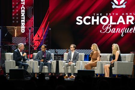 President Dub Oliver leads a panel discussion with representatives from the McAfee School of Business community during the 25th Annual Scholarship Banquet. Represented on the panel were Santhosh Abraham, associate professor of accounting; Evan Thompson, current accounting major; Colene Trent, associate professor of economics; and Jennifer Tibbs, economics alumna. - Photo by Kristi McMurry Woody
