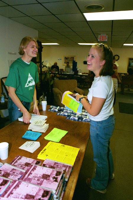 Senior Social Work major Wendy Wiltshire informs new students about LIFE groups during Freshman Move-In. - Photo by Kristen Hiller