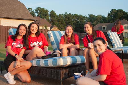New Bulldogs enjoy ice cream at President Oliver's home during Welcome Week. - Photo by Lauren Steed