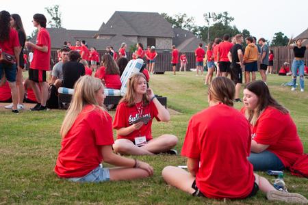 New Bulldogs enjoy fellowship at President Oliver's home during Welcome Week. - Photo by Lauren Steed
