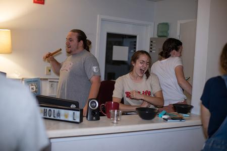 Heritage Resident Advisors Caleb Knapp and Aubrey Eytchison have some karaoke fun during Progressive Snacking. - Photo by Lindsey Atwood