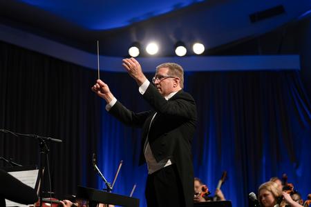John Kinchen, Chair and Professor of Music, conducted the Symphony Orchestra in music that included Beethoven's Symphony #7 in A Major and selections from Pirates of the Caribbean by Klaus Badelt. - Photo by Kristi McMurry Woody