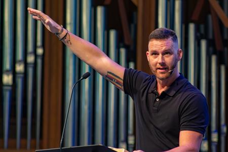 Shane Pruitt, National Next Gen director for the North American Mission Board, delivers an address on wholeness during a chapel service. - Photo by Lyla Dietz