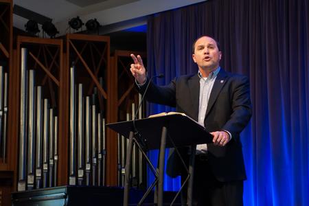Justin Wainscott, associate dean of the School of Theology and Missions, delivers a sermon during a chapel service. - Photo by Lauren Steed