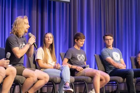 Students who served on GO Trips last year relate their experiences during a chapel service. - Photo by Abigail Aspinwall