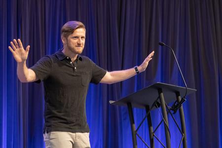 Timothy O’Day, pastor of Christ Fellowship Church in American Fork, Utah, delivers a global focus on missions during a chapel service.  - Photo by Abigail Aspinwall