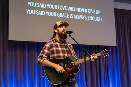 Nathan Shoemaker, worship arts pastor at Fellowship Bible Church in Jackson, Tenn., leads in worship during a chapel service. - Photo by Lauren Steed