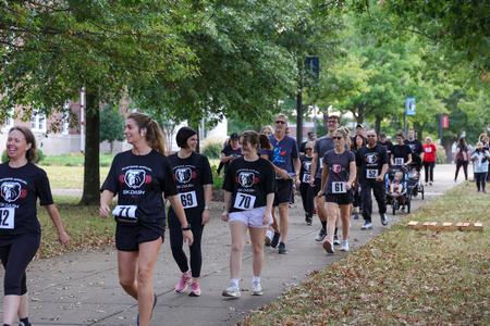 Families enjoy a morning walk together in Buster's Annual 5K Dash during Family Weekend. - Photo by Karley Hathcock