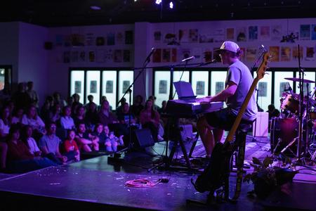 Matthew Eidson performs "Everybody Wants to Rule the World" during an Open Mic Night in Barefoots. - Photo by Lindsey Atwood