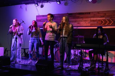 A group of Union students perform during an Open Mic Night in Barefoots. - Photo by Lindsey Atwood