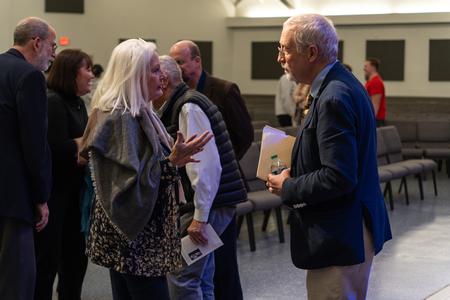 Jean Marie Walls, chair and professor of language, speaks with Alan Taylor after his evening address in the 2023 Carls-Schwerdfeger History Lecture. - Photo by Lauren Steed