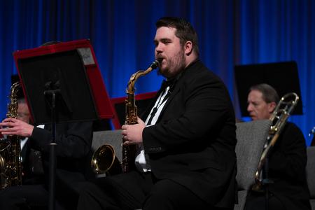 Joshua Phillips plays the tenor saxophone during the Symphonic Band's fall concert. - Photo by Kristi McMurry Woody