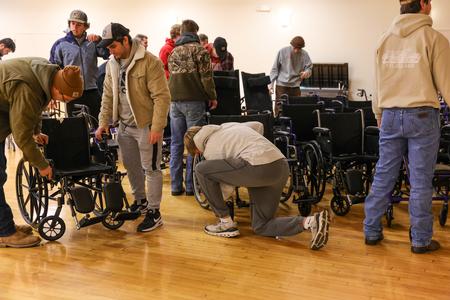 10/31/23 - Members of SAE assemble wheelchairs at the Star Center during Campus and Community Day. - Karley Hathcock