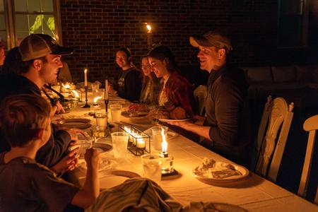 Jeremy Blaschke, associate professor of biology, hosts a group of students for dinner as a part of SAC's Be Our Guest. - Photo by Karley Hathcock