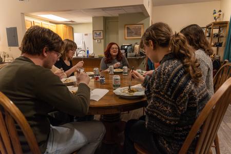 Molly Carter-Neal, associate professor of psychology and faculty-in-residence, hosts a group of students for dinner as a part of SAC's Be Our Guest. - Photo by Karley Hathcock