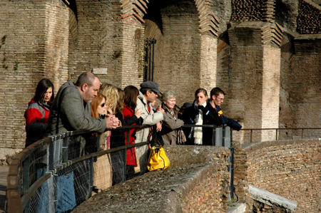 Professors Chris Nadaskay and Pam Sutton chaperone students at the Roman Colosseum on the annual Italy study tour. - Photo by Amanda Herron