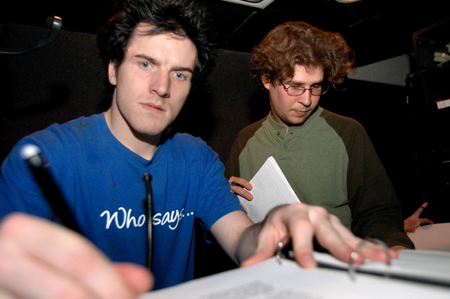 Seniors Patrick Myers & Daniel Graham log lighting cues for the theatre's production of <i>Shadowlands</i>. - Photo by Lindsay Stavish