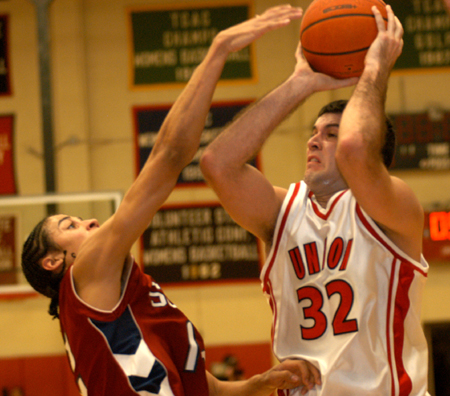 Senior forward Bruno Martinessi (32) attempts a shot over Lyon College defender in Union's win in the TranSouth Tournament Championship Game. - Photo by Jonathan Blair