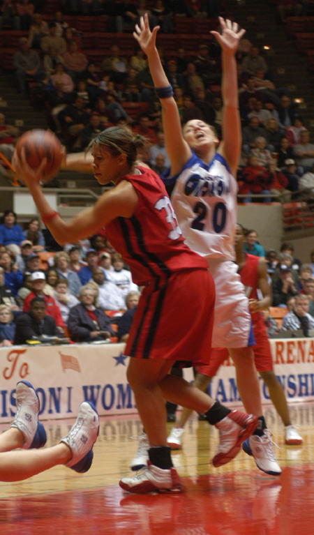 Senior forward Stephanie Clark (33) grabs a rebound during Union's NAIA National Championship win over Oklahoma City, 67-63.  Clark was named tournament MVP. - Photo by Kristen Nicole Sayres