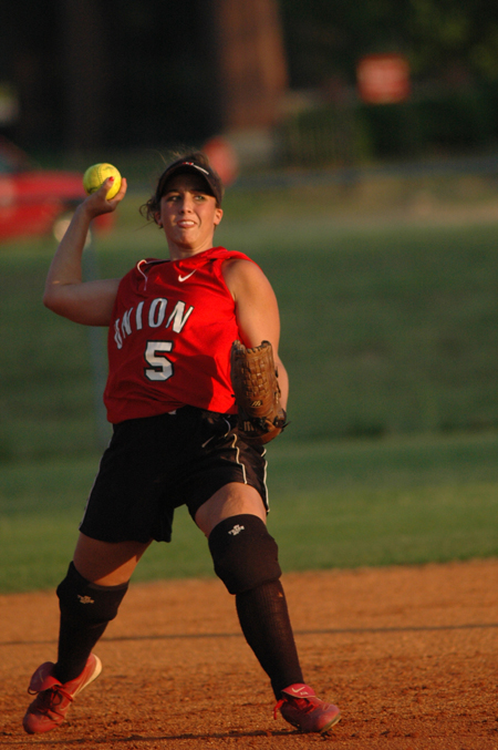 Union shortstop Candace Cross makes a throw across the diamond to first. - Photo by Jonathan Blair