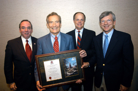 After the SBC reception, Adrian Rogers, pastor emeritus of Bellevue Baptist Church in Memphis, Tenn., poses with the M.E. Dodd Denominational Service Award.  Pictured with Dr. Rogers is David S. Dockery, Union president; Mike Weeks, Union trustees' chairman of the board; and Harry Smith, Union trustee. - Photo by Morris Abernathy