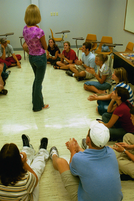 Sarah Anderson's FOCUS group enjoys a bonding game during New Student Orientation 2002. - Photo by Kristen Hiller