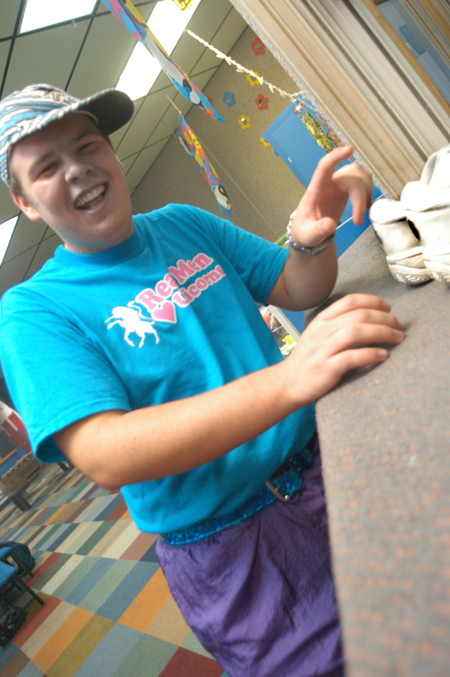 Freshman Tyler Glodjo trades his shoes in for skates during 80s Skate Night. - Photo by Jonathan Blair