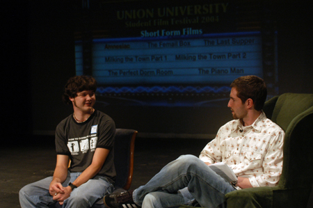 DMS major Tyson Cadenhead talks about his films <i>The Perfect Dorm Room</i>, <i>The Piano Man</i>, <i>The Last Supper</i>, and <i>2241</i> with host Eric Murrell during the 2004 Student Film Festival. - Photo by Jonathan Blair