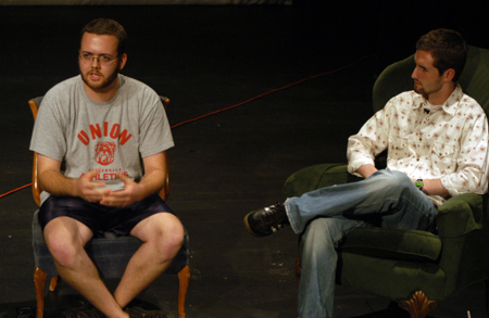 History major James Berger talks about his film <i>Dust and Ashes</i> with host Eric Murrell during the 2004 Student Film Festival. - Photo by Jonathan Blair