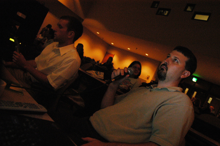 DMS major Andrew Skaggs and DMS Society advisor Cam Tracy handle the technical end of the 2004 Student Film Festival. - Photo by Kristen Nicole Sayres