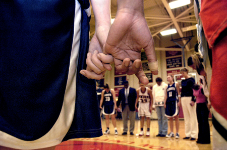 After the game, Union and Lambuth play on the same team in prayer. - Photo by Kathleen Murray