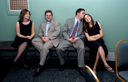 Brandon Boylan, assistant director of wellness, and Neal Rager, coordinator of student leadership development, spend time with their wives, Rachel and Erin, while chaperoning the Cardinal Ball. - Photo by Jonathan Blair